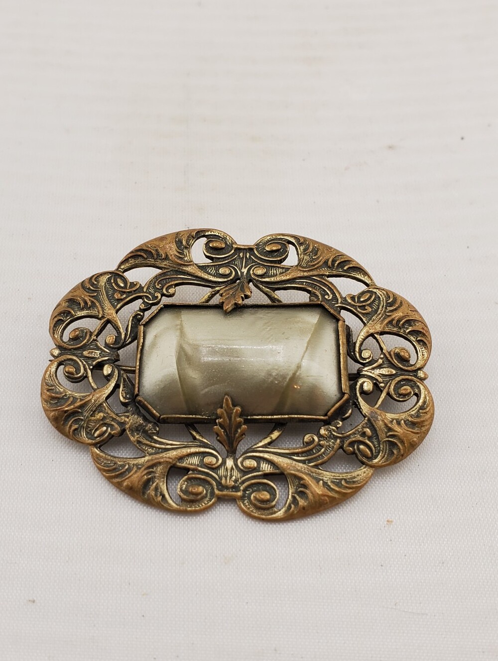 Brass & Early Plastic Brooch